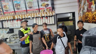 霹移民局突击9商业场所　扣38名涉嫌违例外劳调查